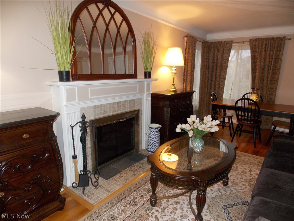 6299 South Canterbury Road Parma, OH 44129 - Photo 6 of 26 Charming fireplace with wonderful architectural beauty.