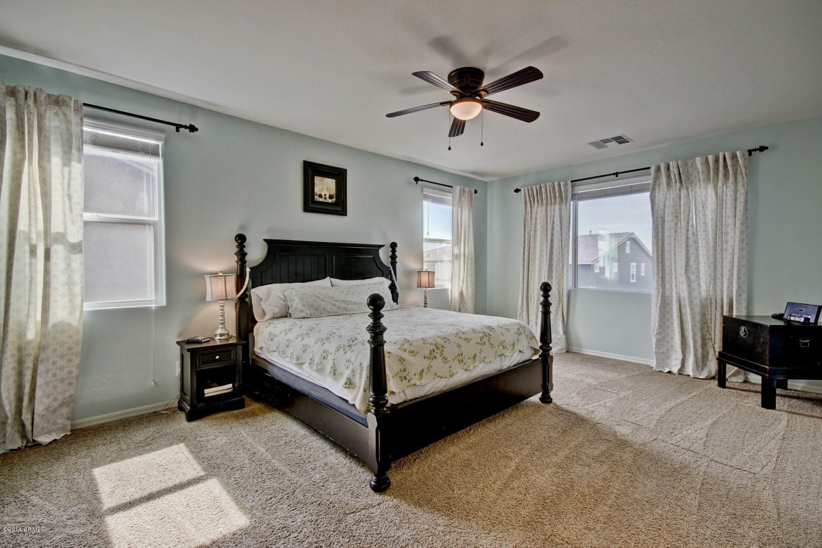 2280 North Alsap Road Buckeye, AZ 85396 - Photo 49 of 65 a bedroom with a bed and furniture