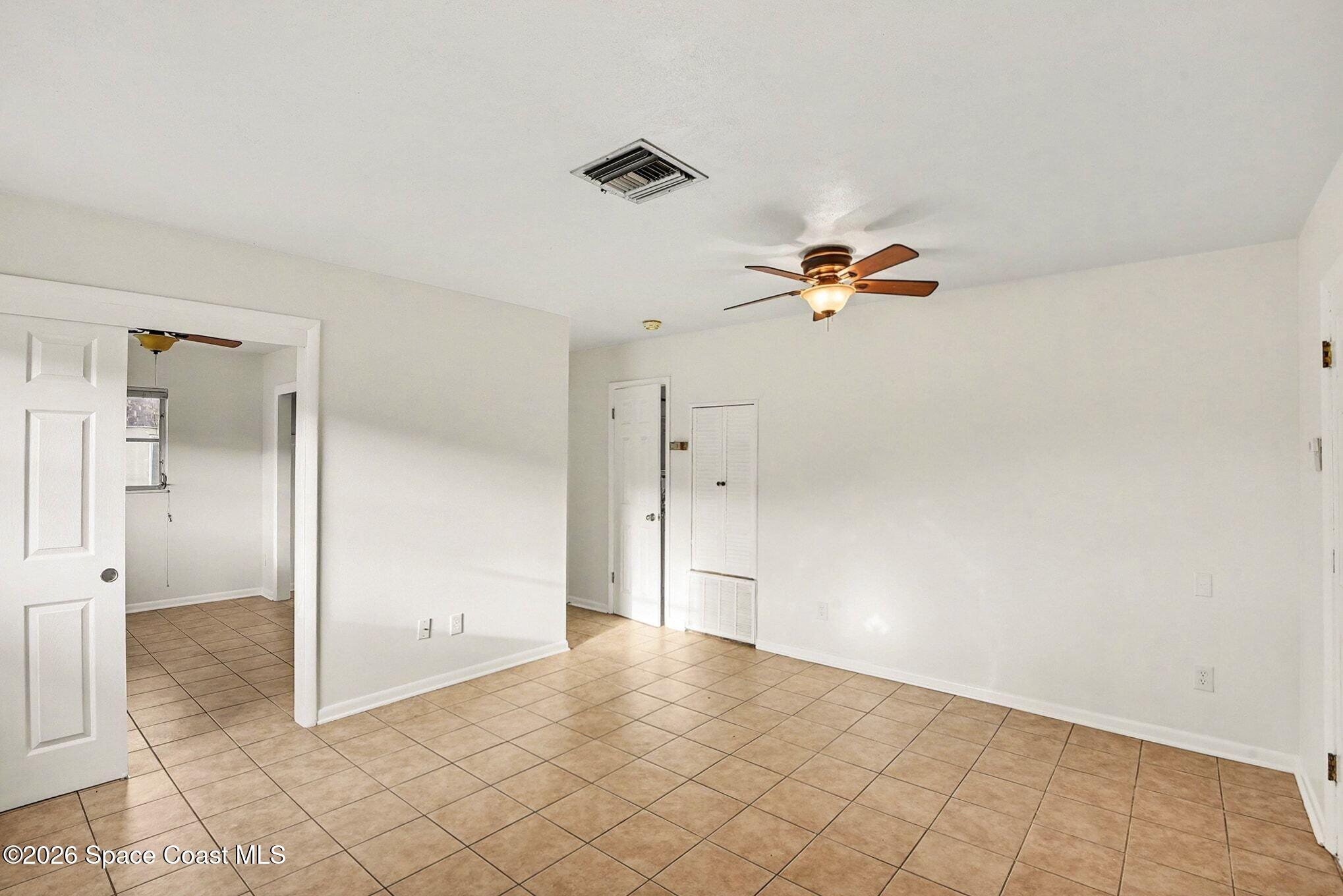 3105 Highway 1, Unit 1 Mims, FL 32754 - Photo 3 of 7 a view of a livingroom and a bathroom