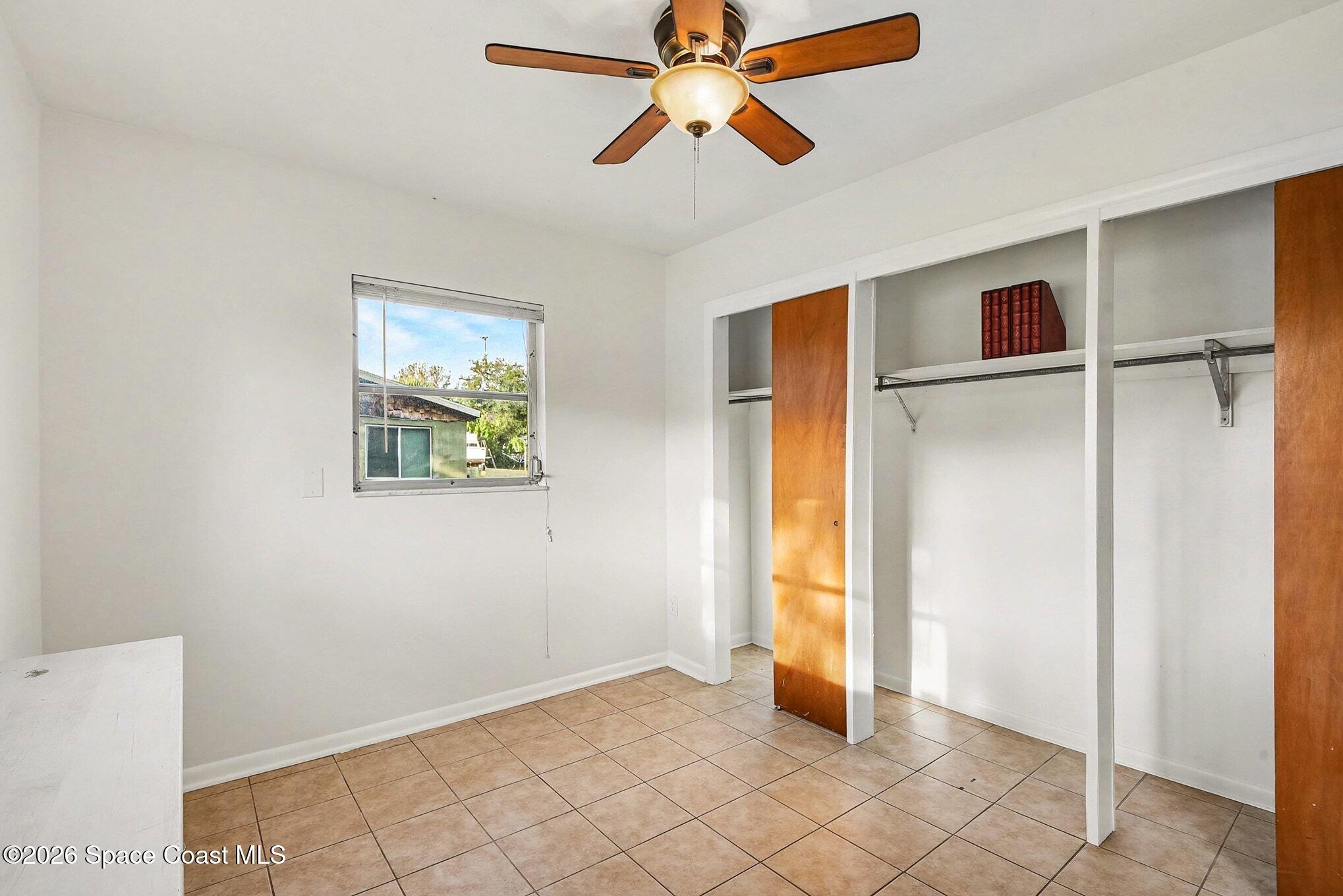 3105 Highway 1, Unit 1 Mims, FL 32754 - Photo 5 of 7 a view of empty room with wooden floor