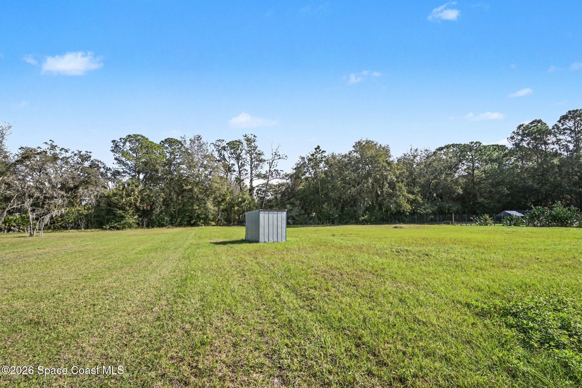 3105 Highway 1, Unit 1 Mims, FL 32754 - Photo 7 of 7 a view of an outdoor space and a yard