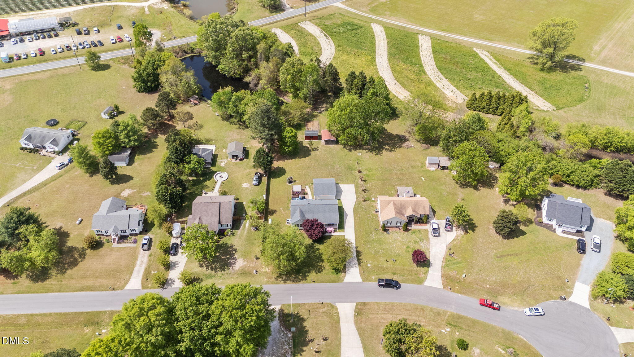 709 Slippery Bank Court Benson, NC 27504 - Photo 13 of 43 an aerial view of swimming pool
