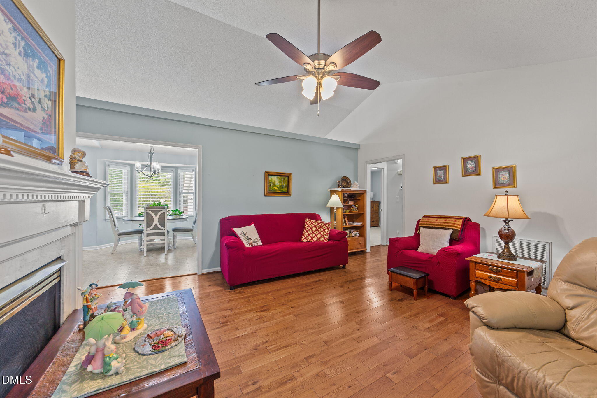 709 Slippery Bank Court Benson, NC 27504 - Photo 21 of 43 a living room with furniture and wooden floor