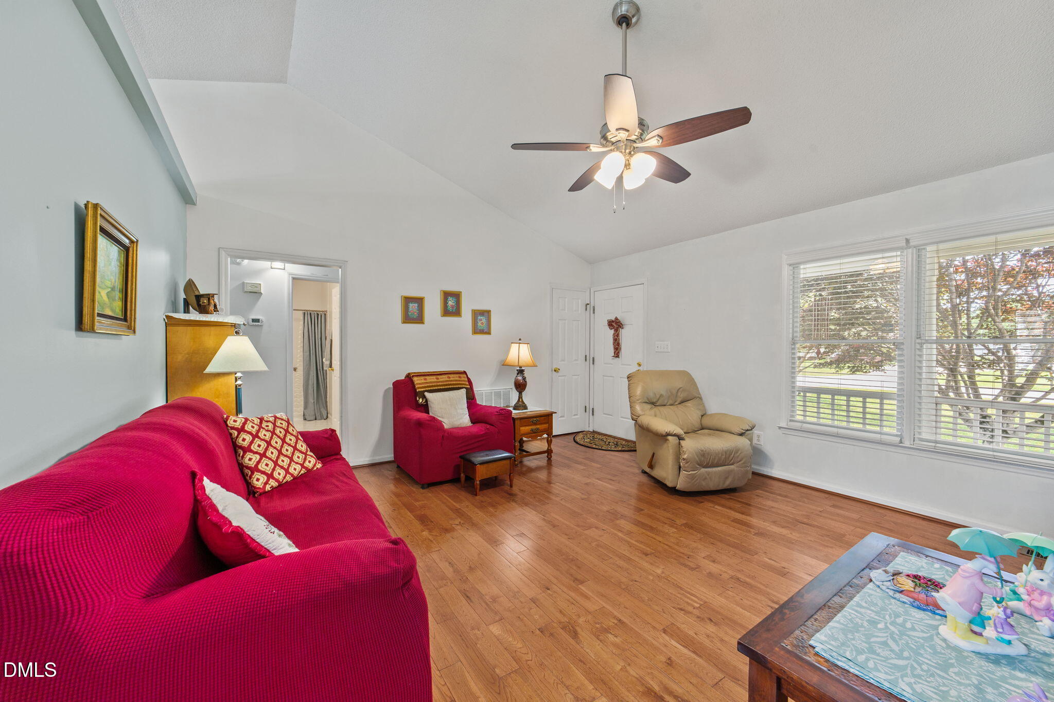 709 Slippery Bank Court Benson, NC 27504 - Photo 22 of 43 a living room with furniture and a window