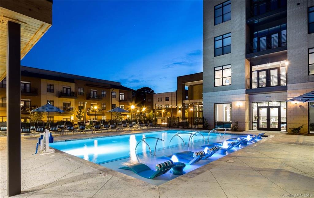 2426 McClintock Road, Unit 405 Charlotte, NC 28205 - Photo 12 of 21 a front view of a building with outdoor area
