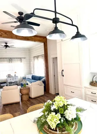 a bedroom with furniture and a chandelier