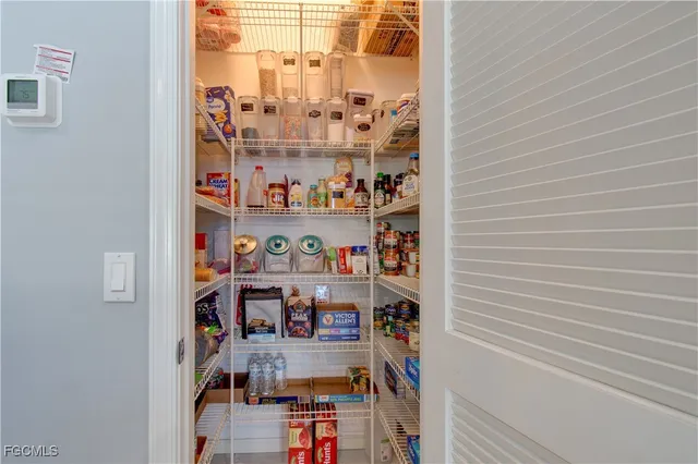 a room with storage and utility