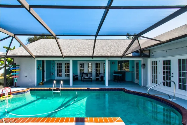 a outdoor space with a table and chairs