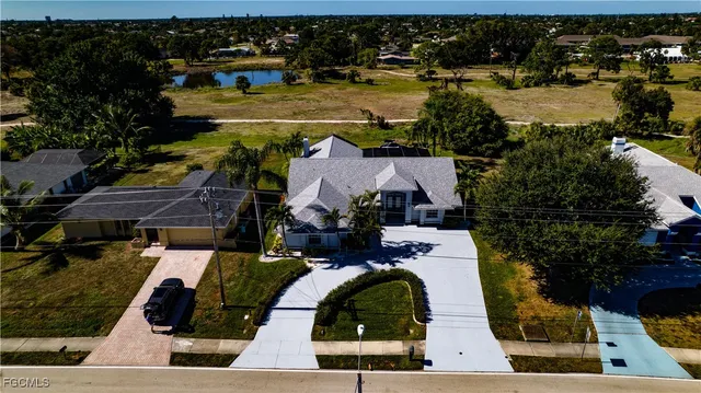 an aerial view of houses with outdoor space