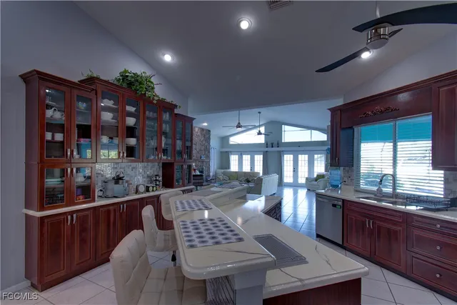 a view of a dining room with furniture and window