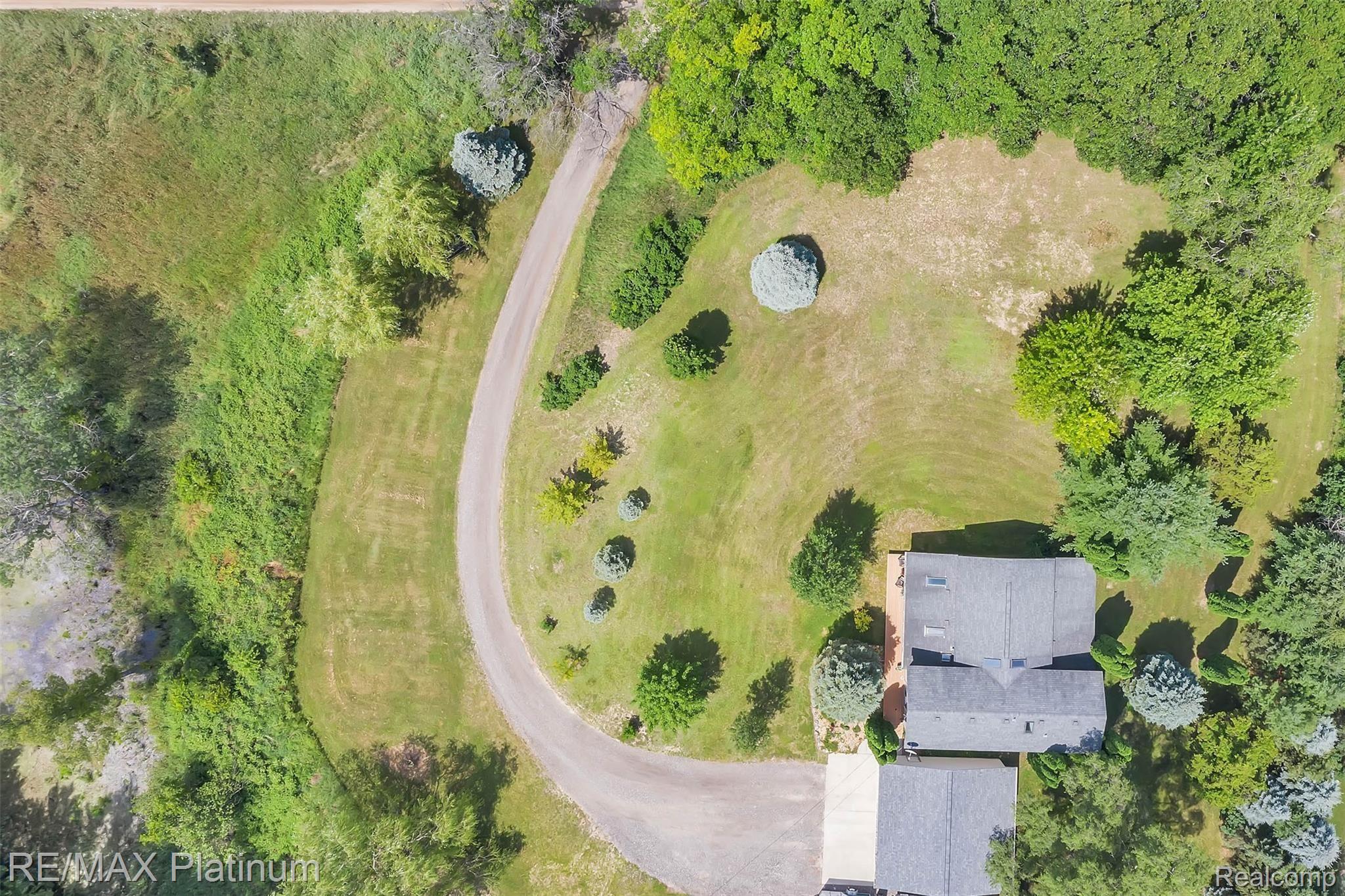 4605 West Schafer Road Pinckney, MI 48169 - Photo 4 of 24 4. Drone Shot 1