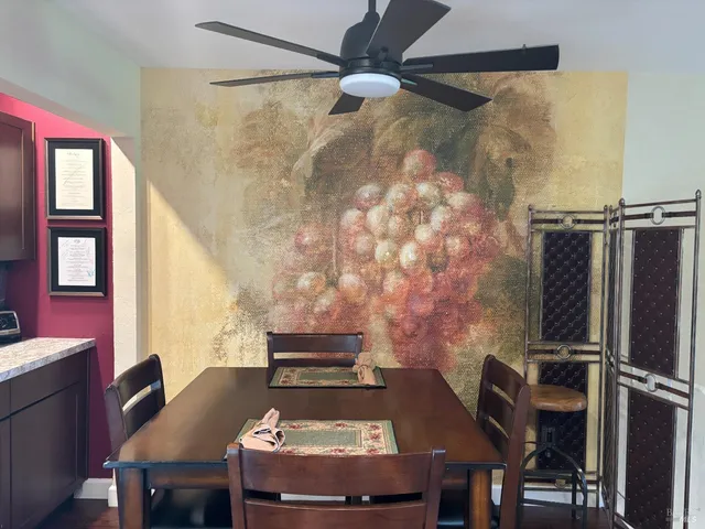 a view of a workspace with furniture