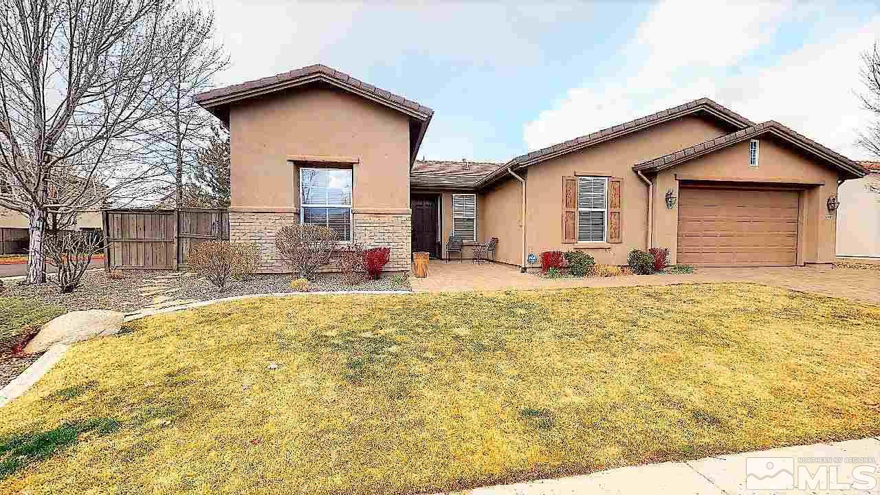 14095 Winners Cup Drive Reno, NV 89521 - Photo 20 of 23 a front view of house with yard