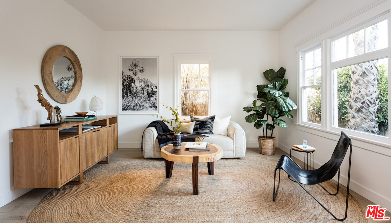 325 Brooks Avenue Venice, CA 90291 - Photo 3 of 25 a living room with furniture a window and a potted plant