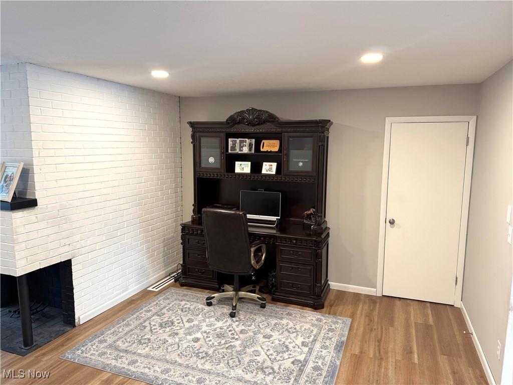 975 Som Center Road Cleveland, OH 44143 - Photo 9 of 18 Office with brick wall and light hardwood / wood-style floors