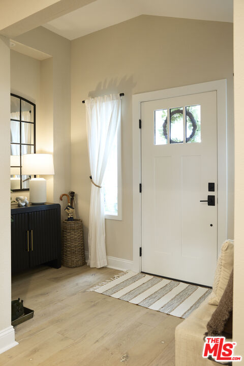 358 Via Metates Oceanside, CA 92057 - Photo 21 of 29 a room with a bed and a mirror