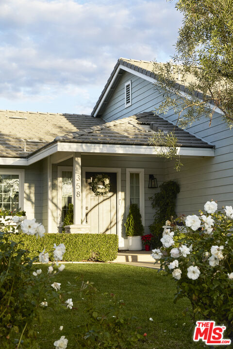 358 Via Metates Oceanside, CA 92057 - Photo 22 of 29 a front view of a house with a small yard
