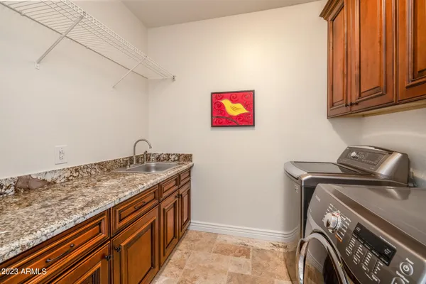 a view of a swimming pool with an outdoor space and seating area