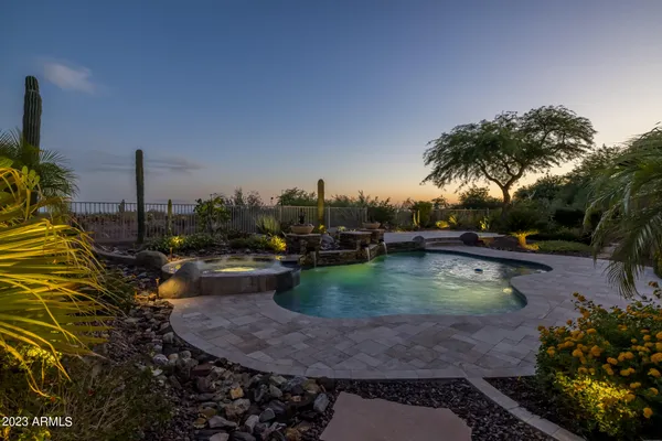 a view of a balcony and chairs