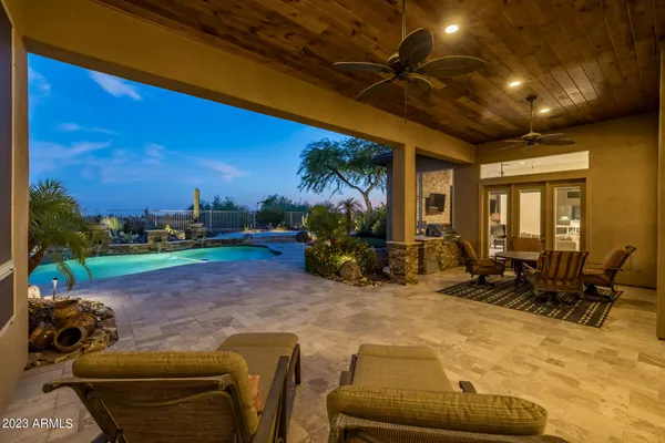 an aerial view of a house with a garden