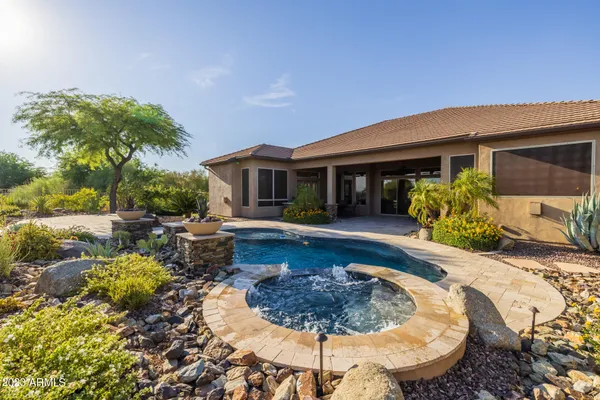 a view of a lake with a building in the background