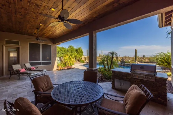an aerial view of house with yard