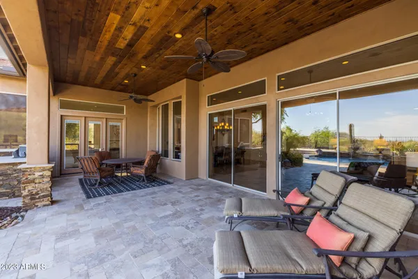 a front view of a house with lots of green space