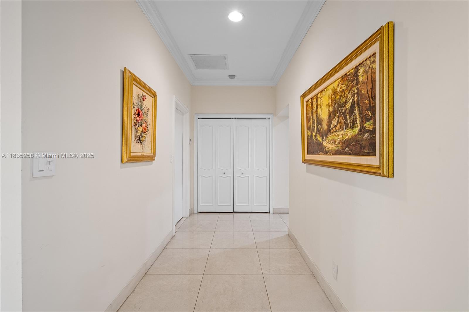 10735 Southwest 58th Avenue Pinecrest, FL 33156 - Photo 17 of 75 a view of an empty room with painting on the wall