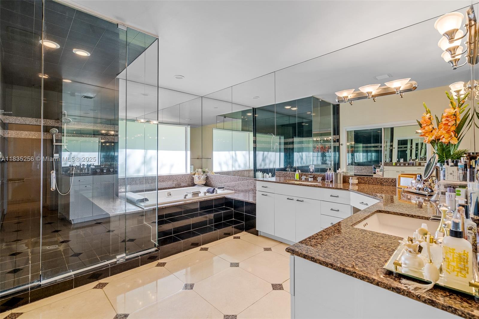 10735 Southwest 58th Avenue Pinecrest, FL 33156 - Photo 39 of 75 a kitchen with stainless steel appliances granite countertop a sink and cabinets