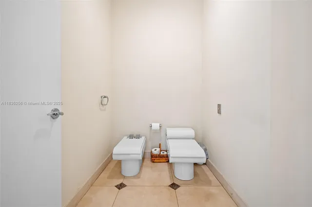 a front view of house with yard and trees