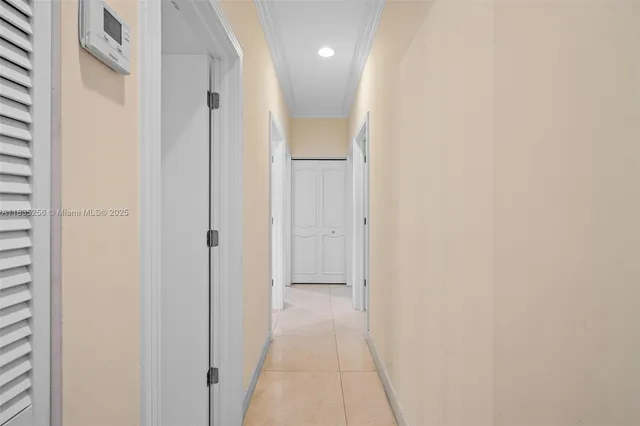 a view of a house with swimming pool and sitting area