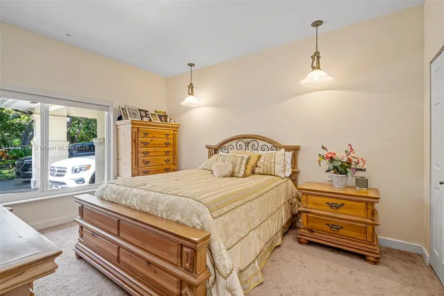 a view of a swimming pool with lounge chair
