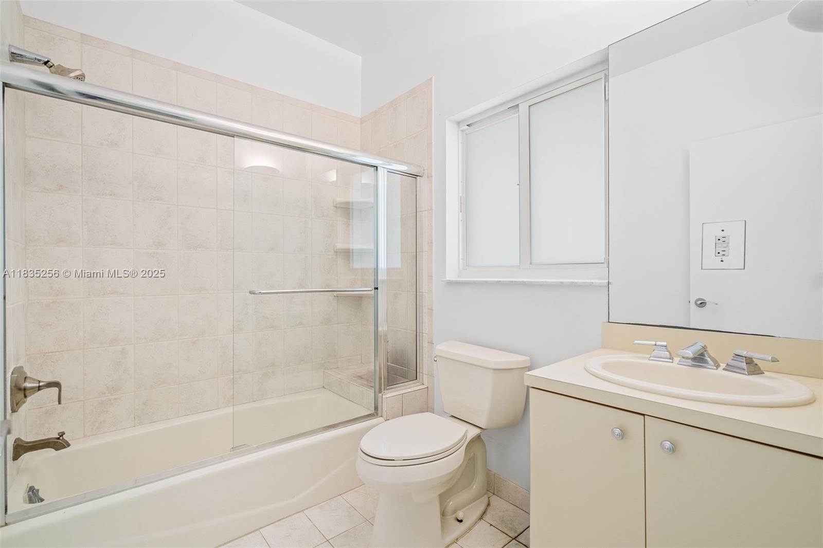 10735 Southwest 58th Avenue Pinecrest, FL 33156 - Photo 58 of 75 a bathroom with a sink toilet and shower