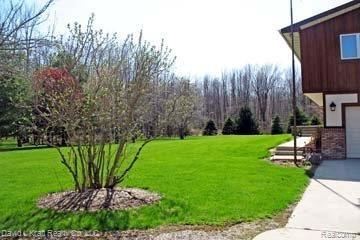 1750 Sand Road Port Austin, MI 48467 - Photo 23 of 25 1750SandRdFrontYard2.jpg