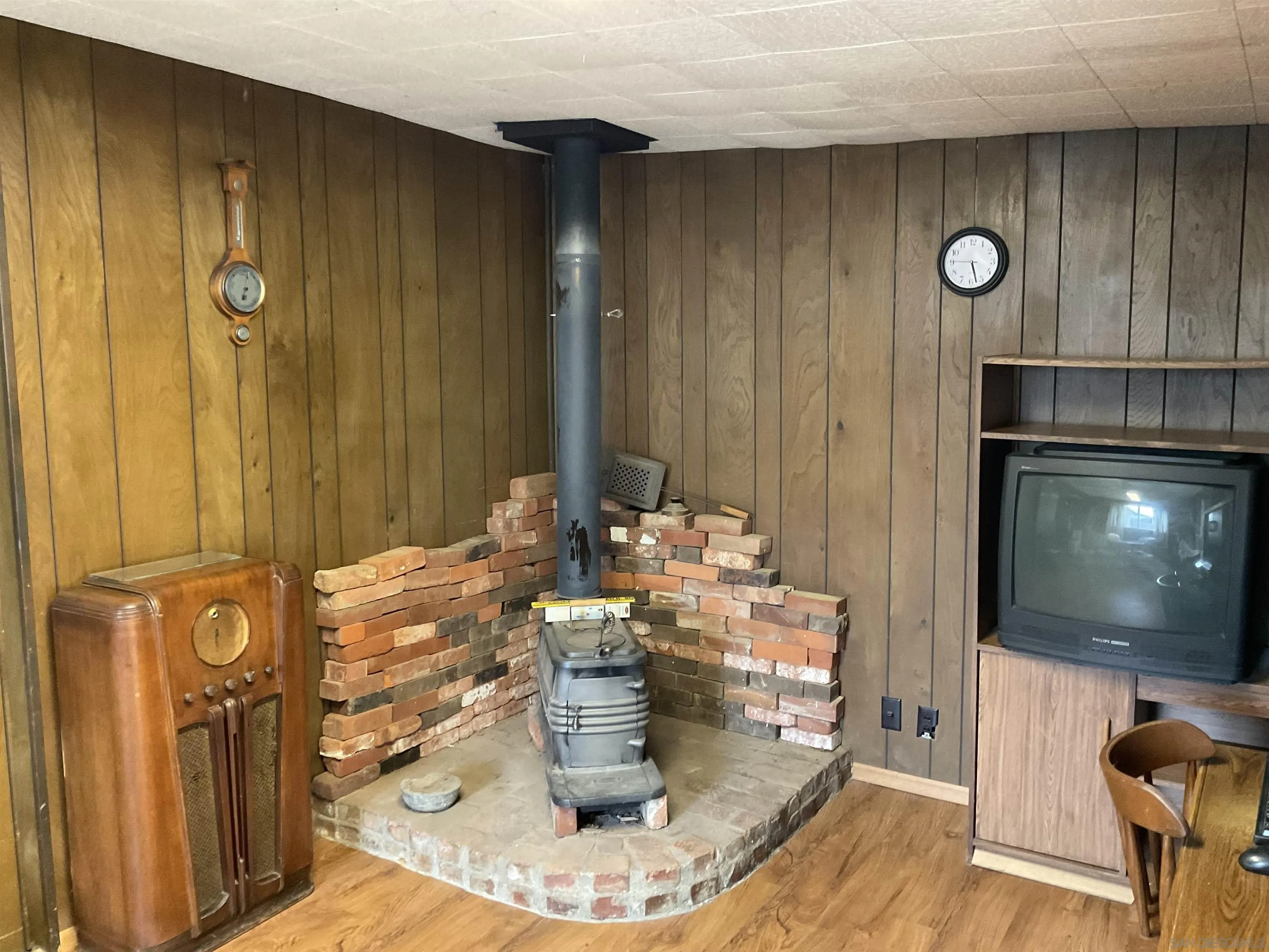 1221 Rees Road Escondido, CA 92026 - Photo 12 of 20 a view of a living room with furniture and a fireplace