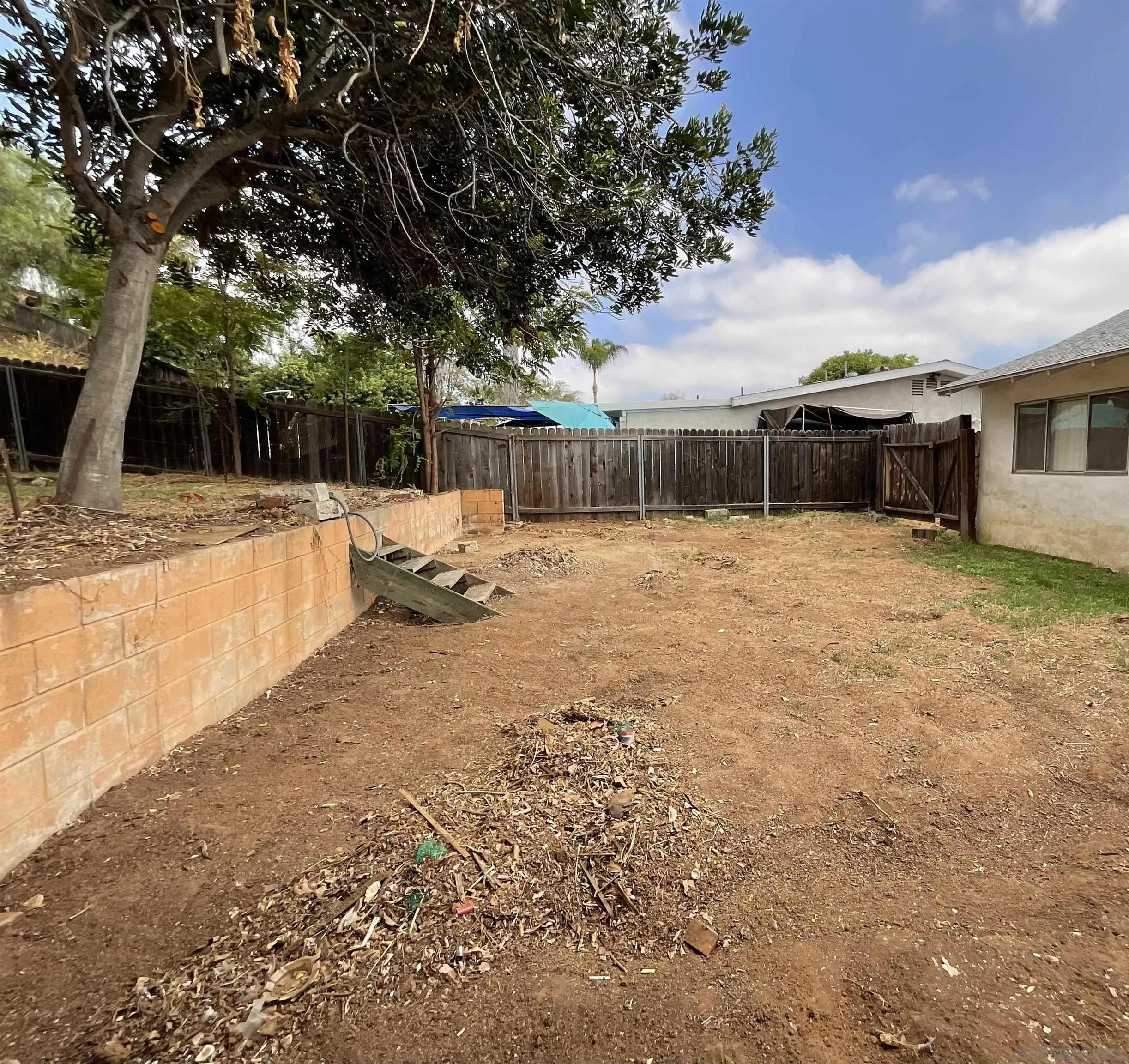 1221 Rees Road Escondido, CA 92026 - Photo 19 of 20 a view of a backyard of the house