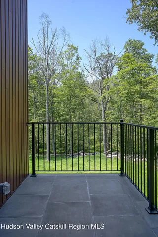 a view of a street from a balcony