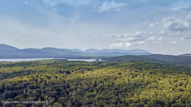 a view of mountain and an outdoor space