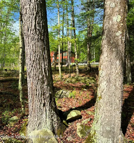 a view of a yard with an outdoor seating