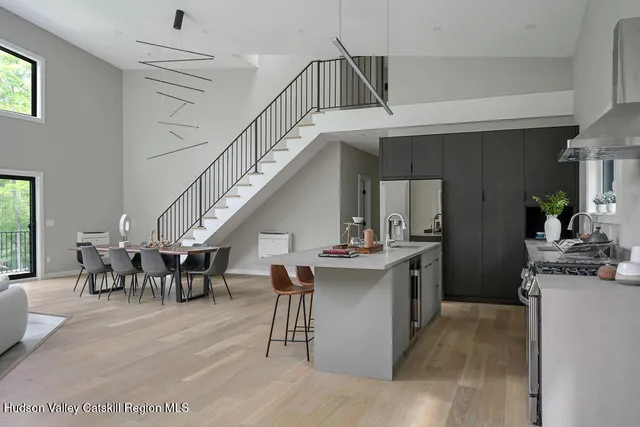 a view of a kitchen and dining room