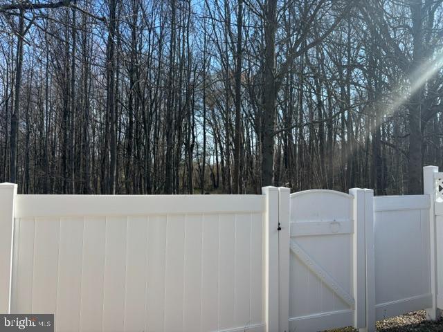 57 Windsor Pond Road Princeton Junction, NJ 08550 - Photo 11 of 37 a white house with a trees in front of it