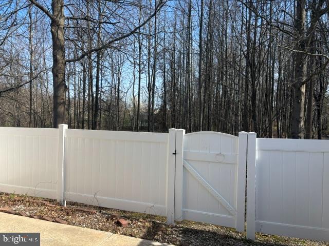 57 Windsor Pond Road Princeton Junction, NJ 08550 - Photo 12 of 37 a view of a utility room with trees