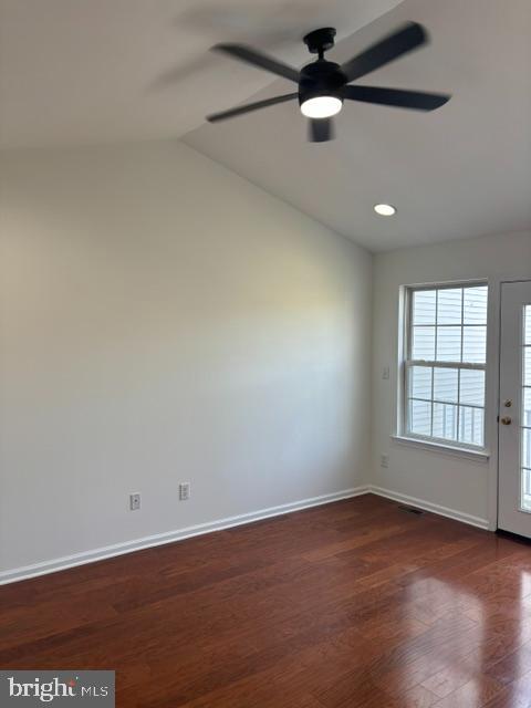 57 Windsor Pond Road Princeton Junction, NJ 08550 - Photo 16 of 37 an empty room with wooden floor ceiling fan and windows