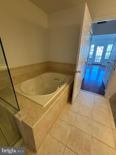 57 Windsor Pond Road Princeton Junction, NJ 08550 - Photo 21 of 37 a bathroom with a tub and shower