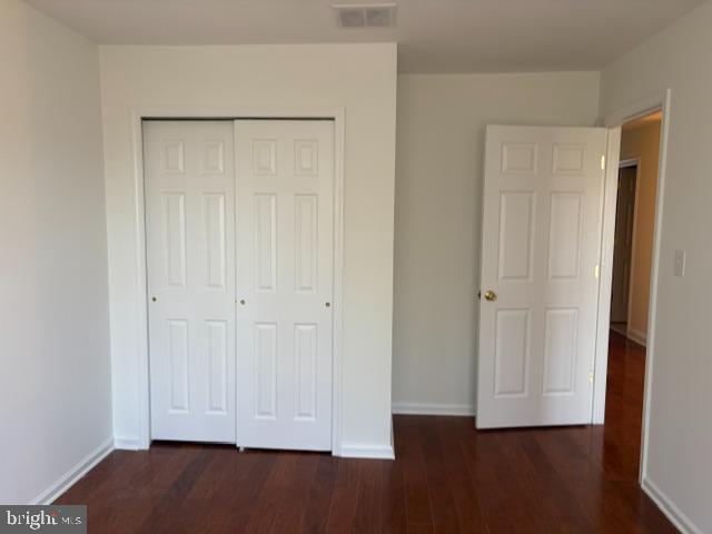 57 Windsor Pond Road Princeton Junction, NJ 08550 - Photo 22 of 37 a view of an empty room with wooden floor