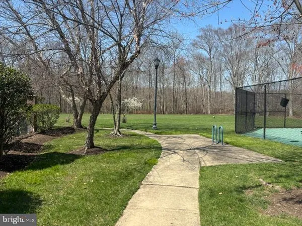 a view of a park with swings