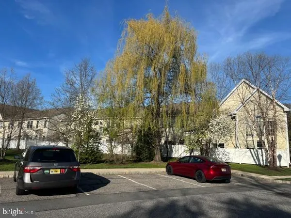 a view of a yard with an trees