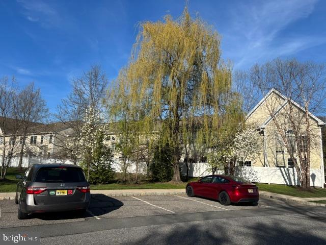 57 Windsor Pond Road Princeton Junction, NJ 08550 - Photo 36 of 37 a car parked in front of a building