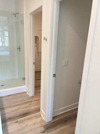a view of a bathroom from the hallway