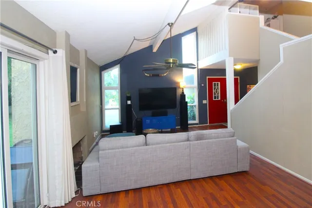 a kitchen with a refrigerator and a sink